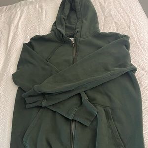 Size small green zip up hoodie